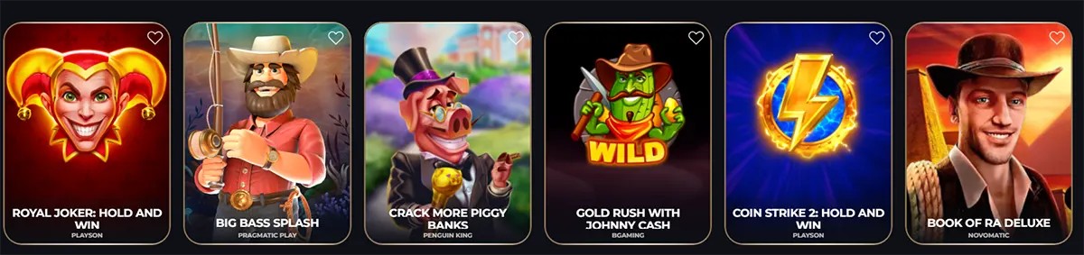 Slot game carousel showing six thumbnails—Royal Joker: Hold and Win, Big Bass Splash, Crack More Piggy Banks, Gold Rush with Johnny Cash, Coin Strike 2: Hold and Win, and Book of Ra Deluxe—each with a small heart icon in the corner.